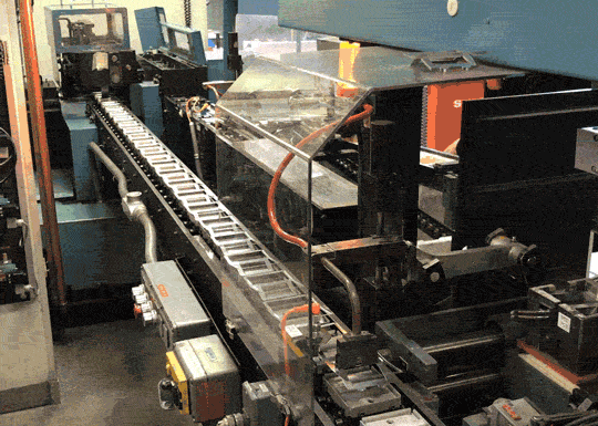 Jun 5: A cool miniature camera, photos of the Polaroid factory, a 717 gigapixel image and more