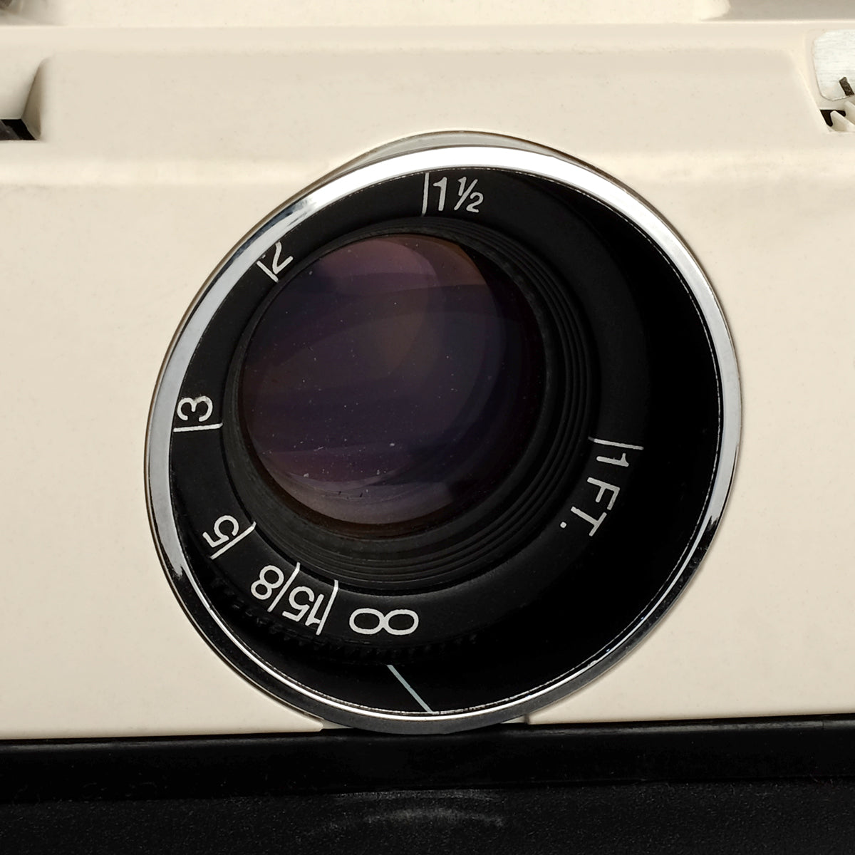 Will dust in the lens of my Polaroid folding camera affect the final image?