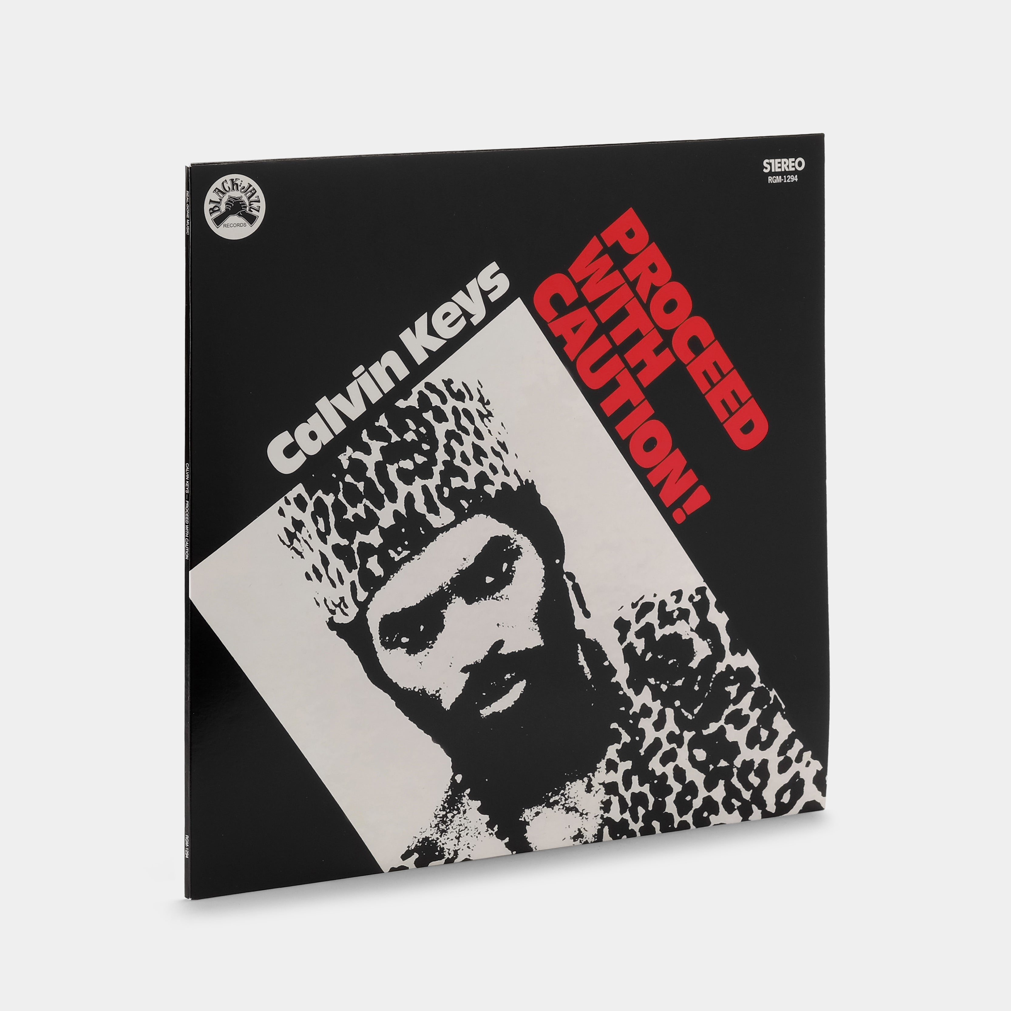 Calvin Keys - Proceed With Caution! LP Orange & Black Swirl Vinyl Record