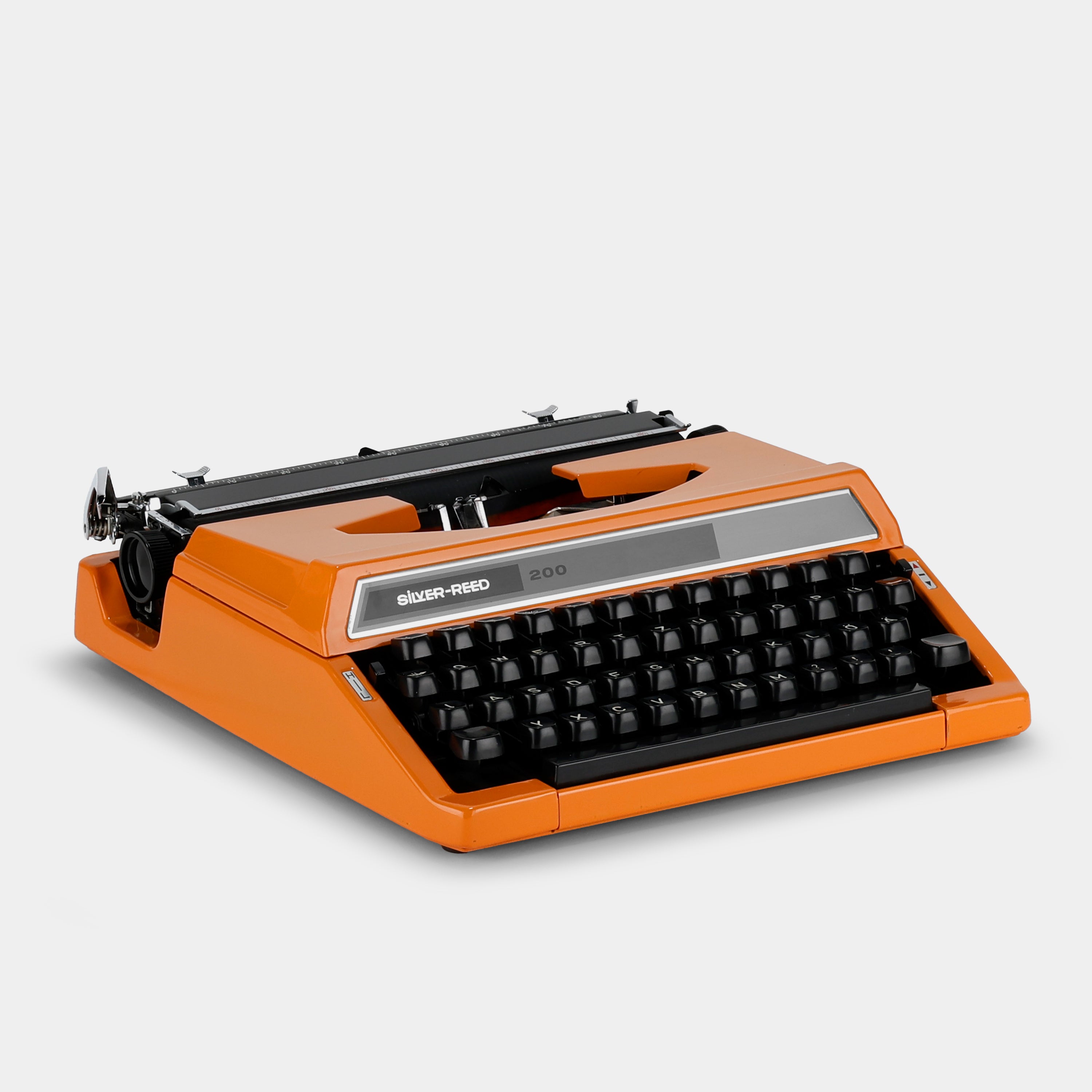 Silver-Reed 200 Orange Manual Typewriter and Case