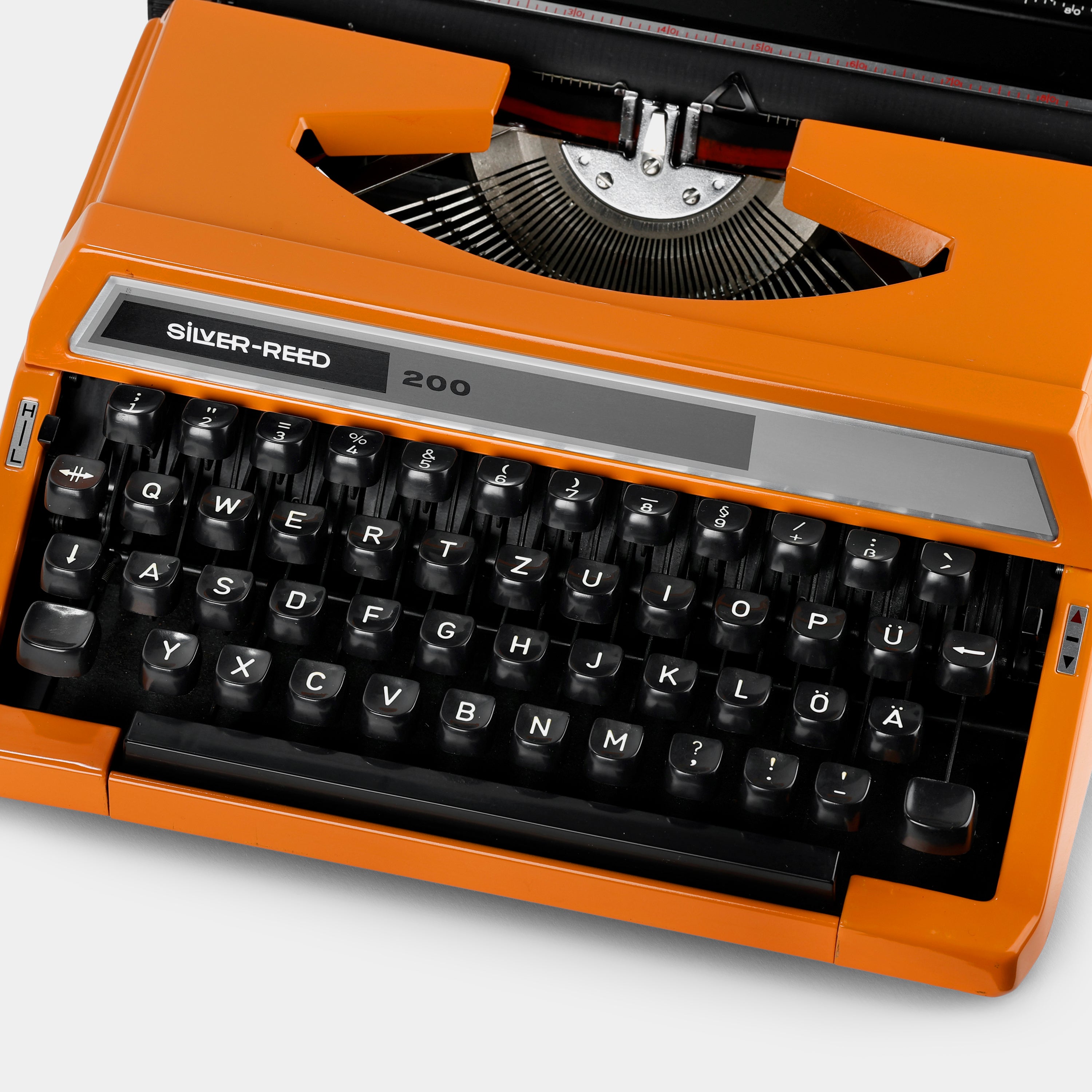 Silver-Reed 200 Orange Manual Typewriter and Case