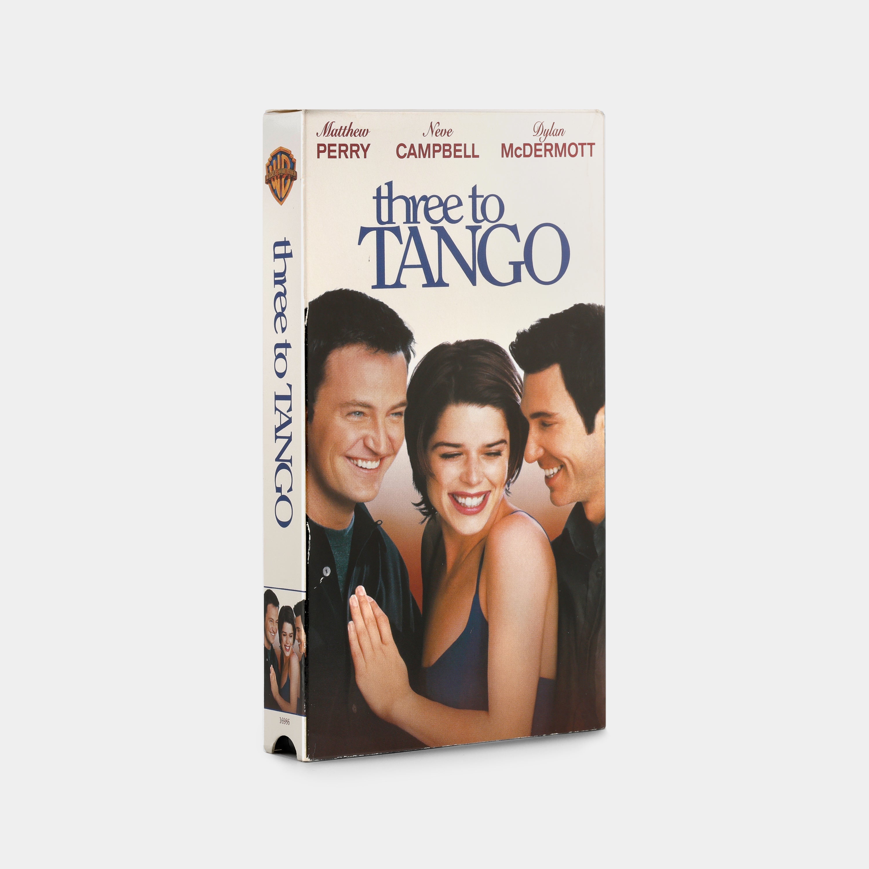 Three to Tango VHS Tape