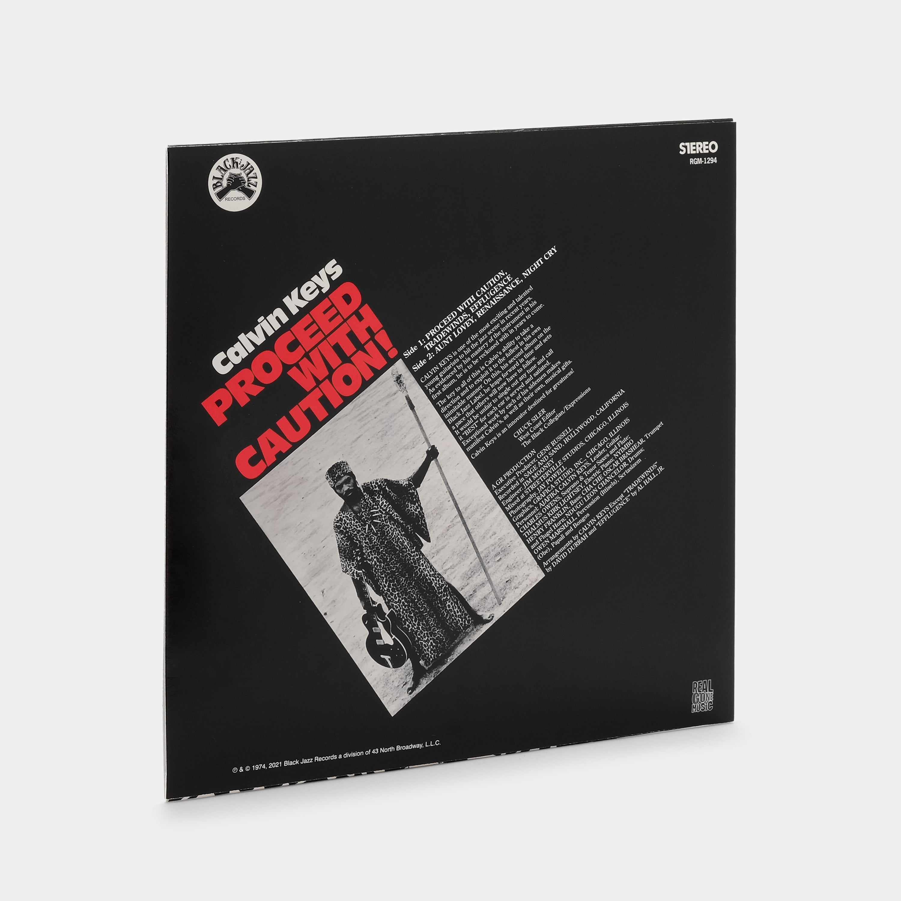 Calvin Keys - Proceed With Caution! LP Orange & Black Swirl Vinyl Record