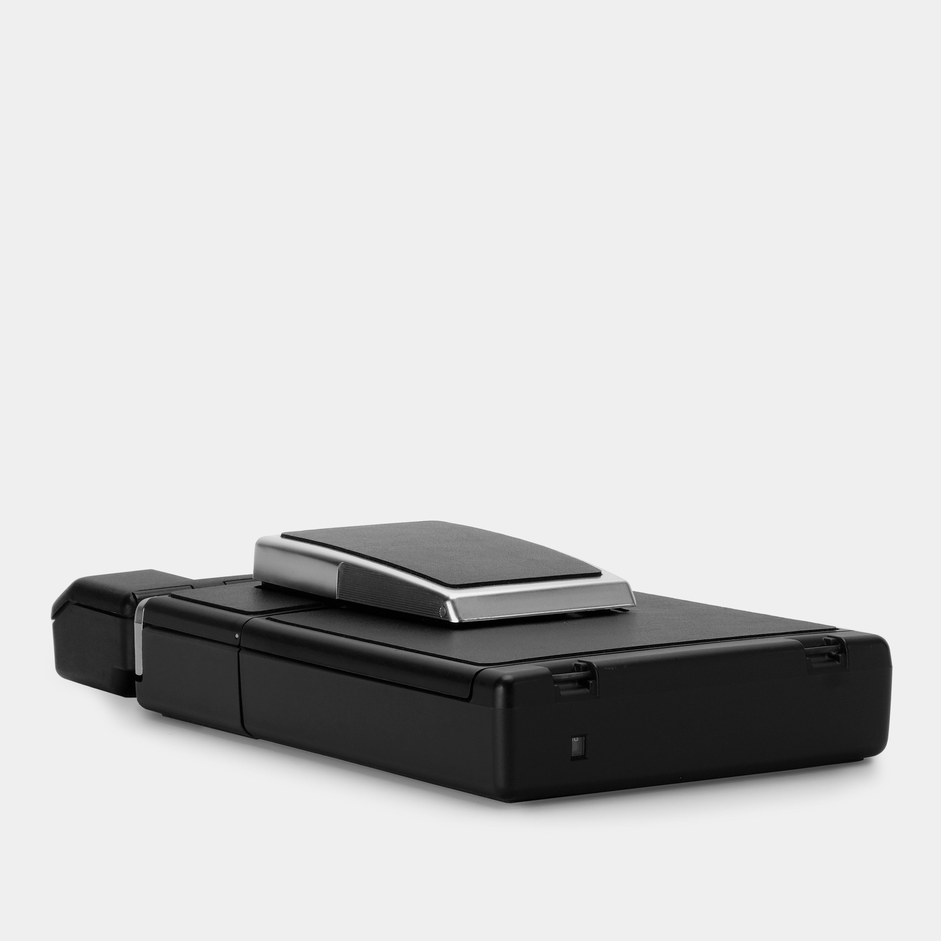 Polaroid SX-70 Sonar Autofocus Black with Chrome Folding Instant Film Camera