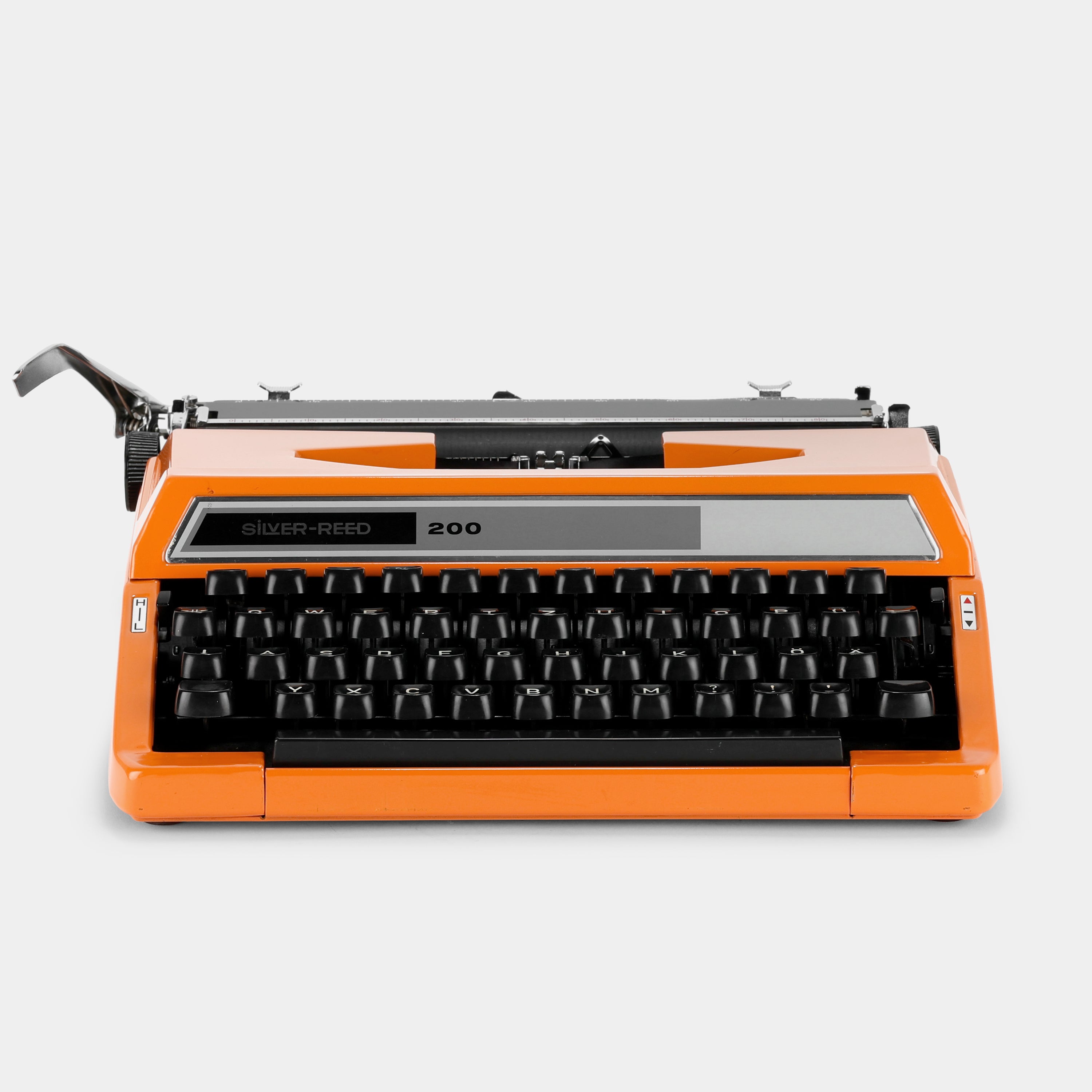 Silver-Reed 200 Orange Manual Typewriter and Case