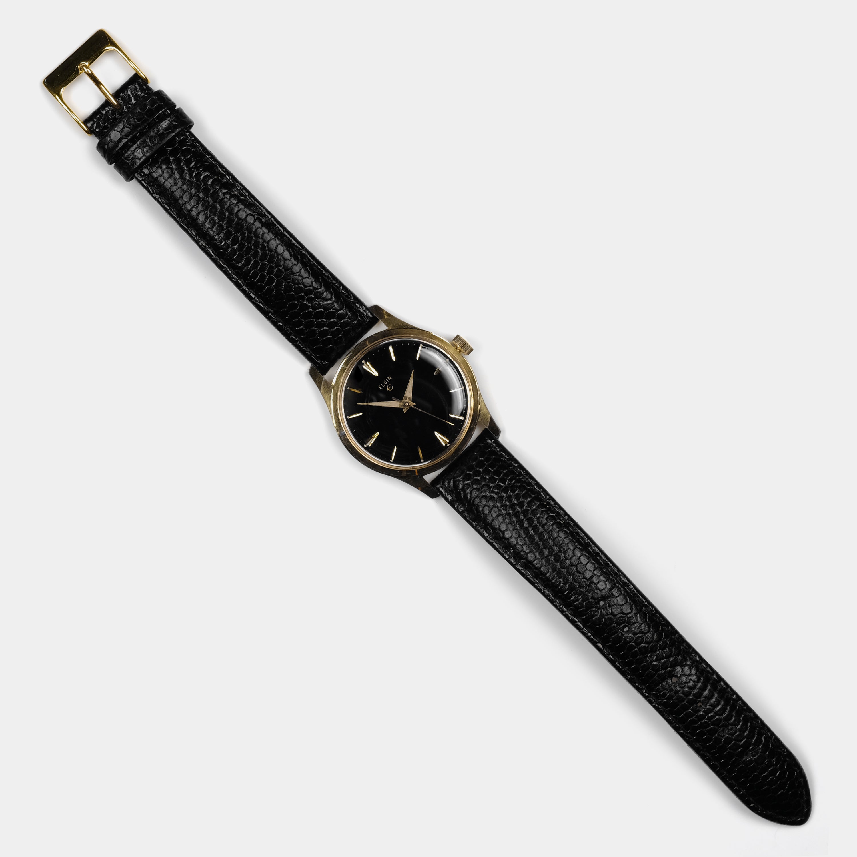 Elgin black and online gold watch