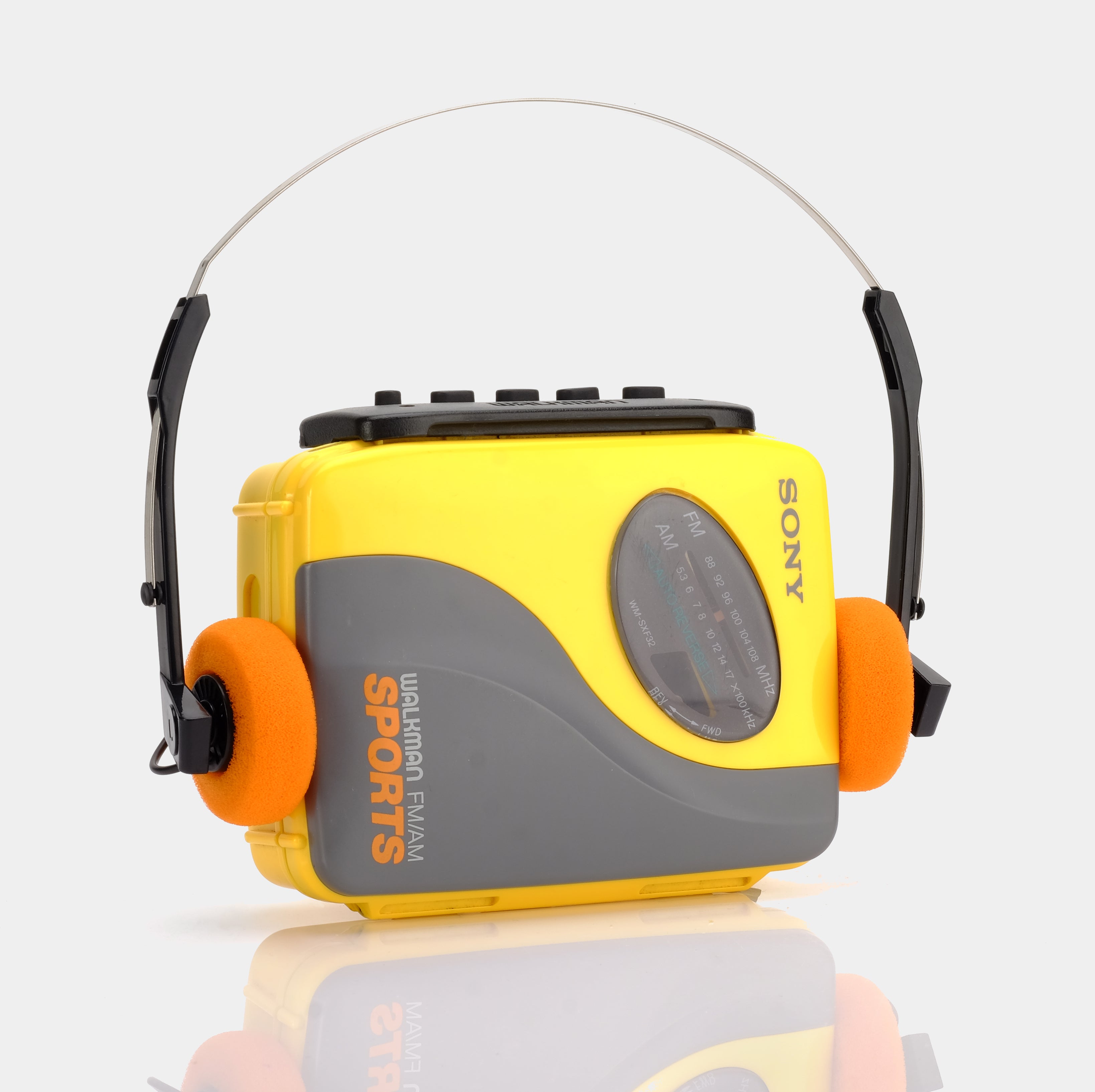 yellow walkman cassette player